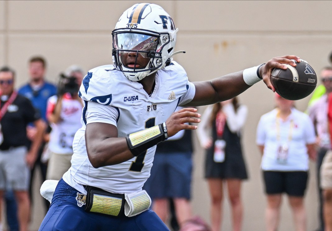 Florida International Panthers quarterback Keyone Jenkins (1) throws a pass during the first half at Memorial Stadium