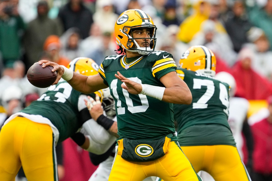 Green Bay Packers quarterback Jordan Love (10) throws a pass during the second quarter against the Arizona Cardinals at Lambeau Field