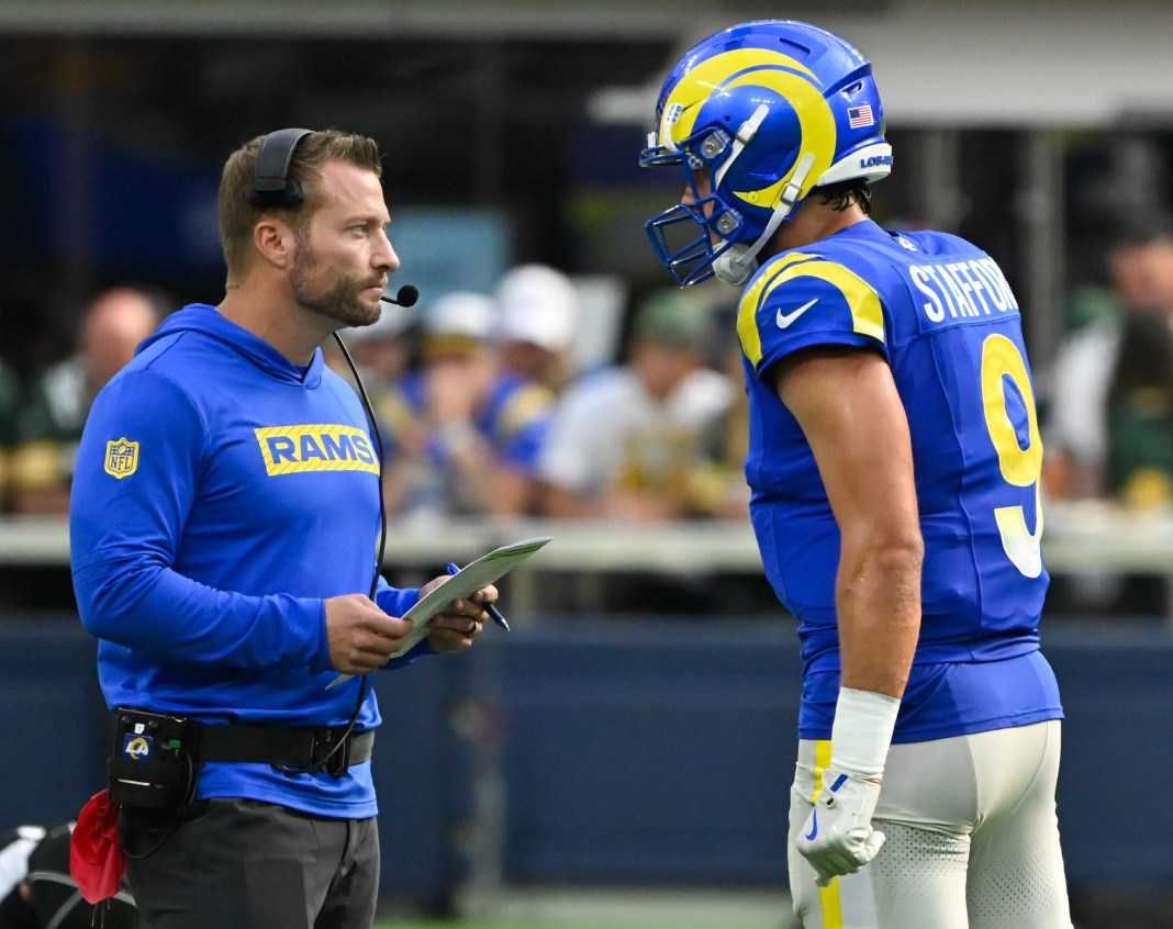 Los Angeles Rams head coach Sean McVay talks to quarterback Matthew Stafford (9) during the third quarter against the Green Bay Packers