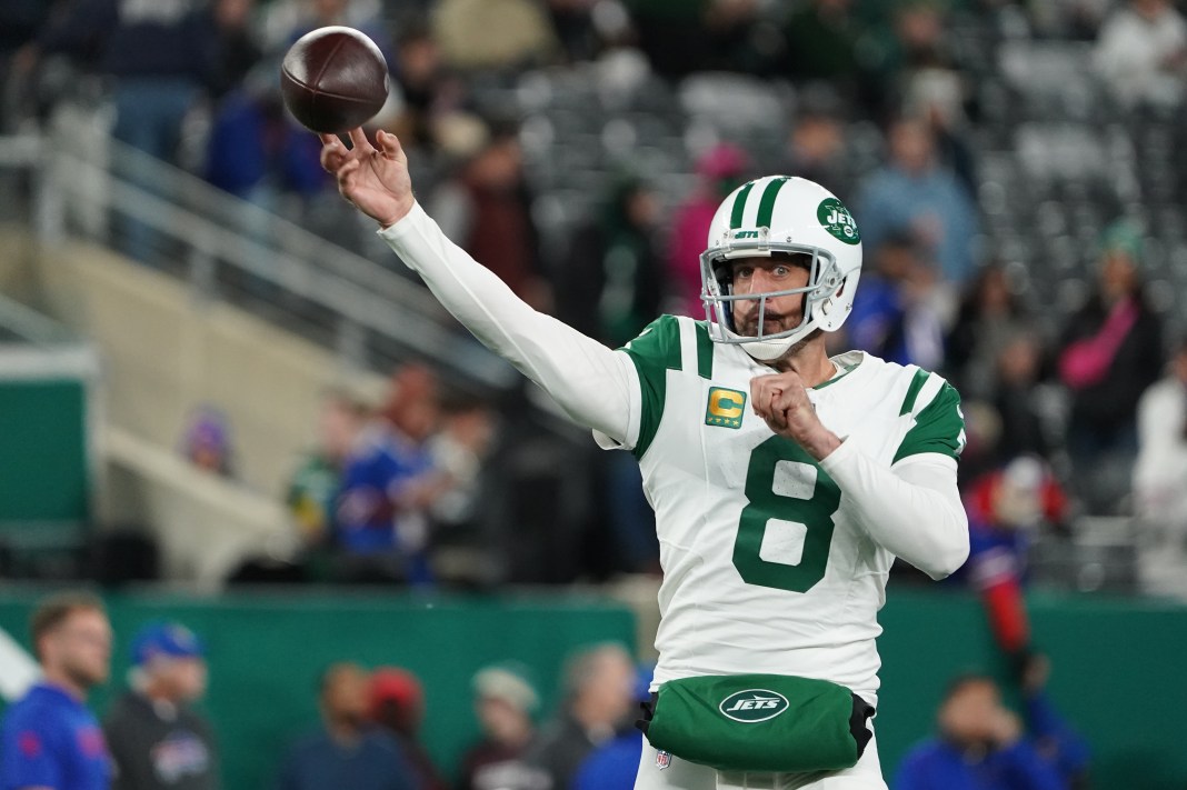 New York Jets quarterback Aaron Rodgers (8) warms up before the game against the Buffalo Bills at MetLife Stadium