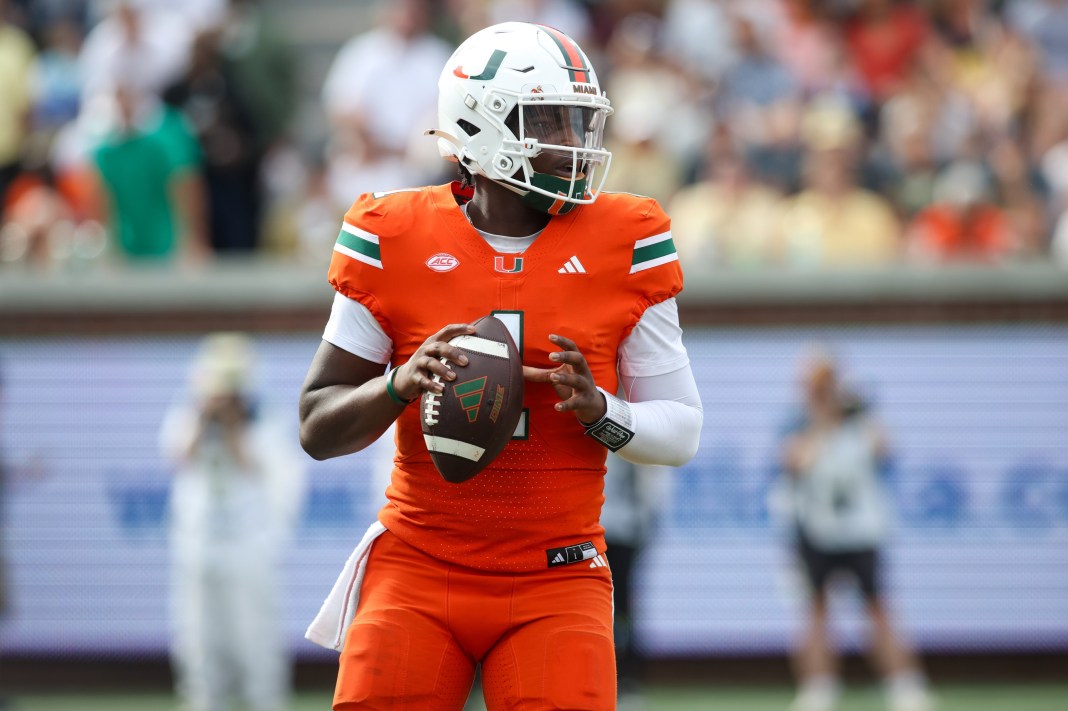 Miami Hurricanes quarterback Cam Ward drops back to pass against the Georgia Tech Yellow Jackets