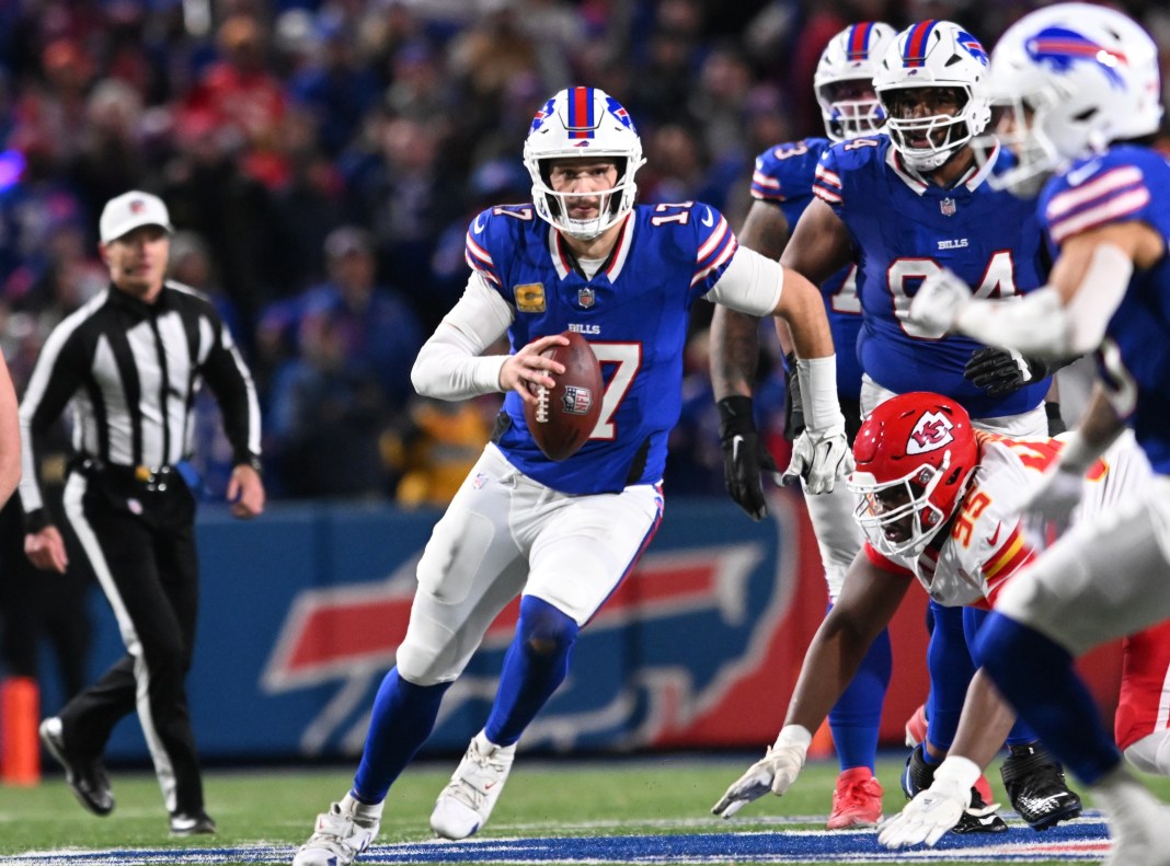 Buffalo Bills quarterback Josh Allen runs for a first down in the second quarter against the Kansas City Chiefs at Highmark Stadium