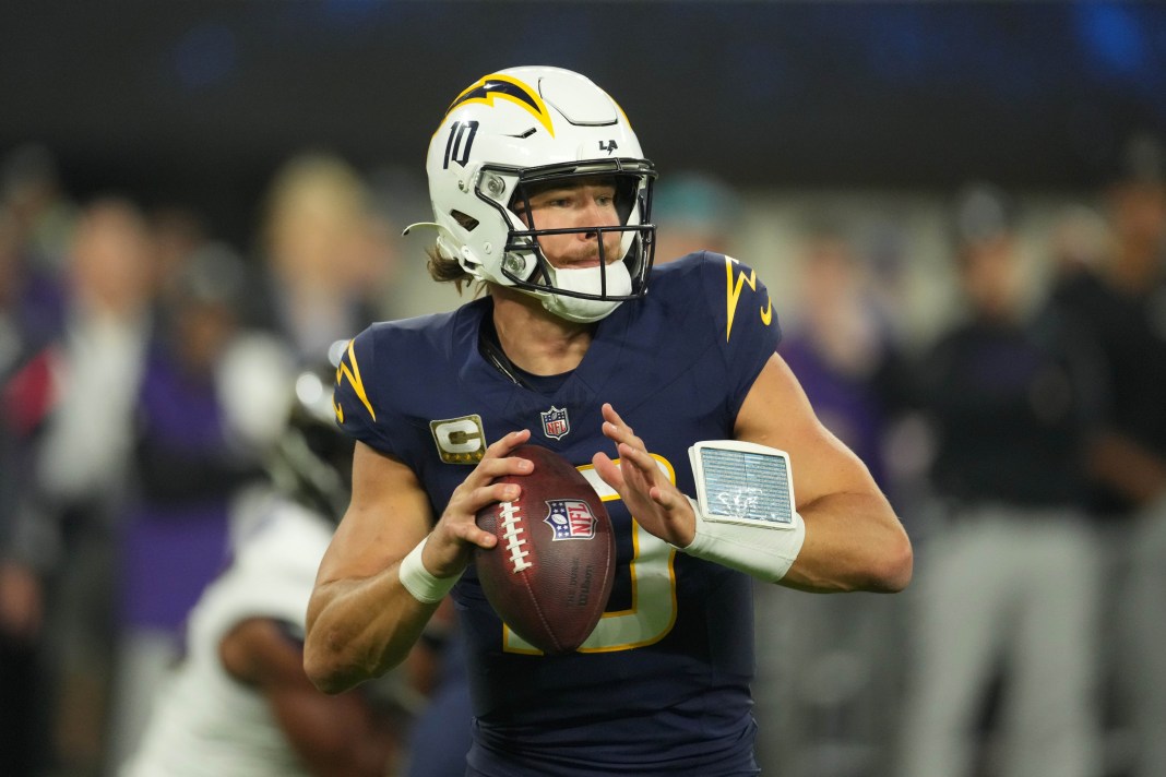 Los Angeles Chargers quarterback Justin Herbert throws the ball against the Baltimore Ravens