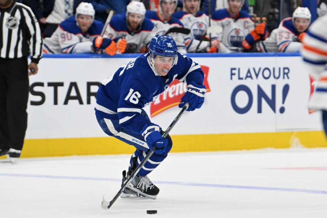 Toronto Maple Leafs forward Mitch Marner skates with the puck against the Edmonton Oilers