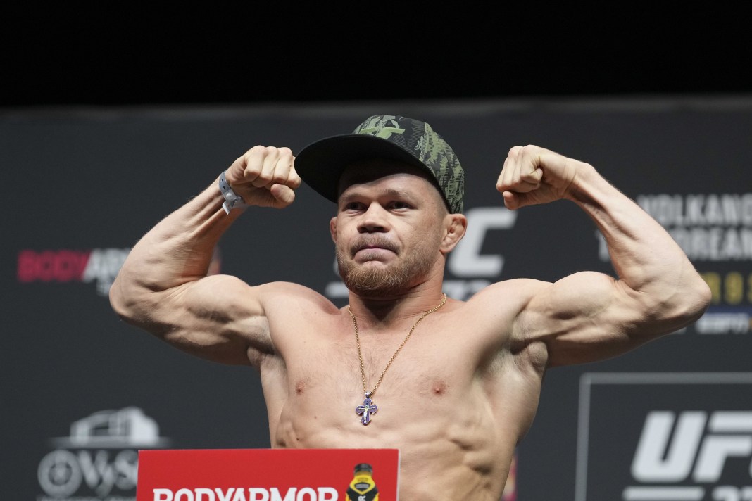 Petr Yan on the scale during weigh ins for UFC 273