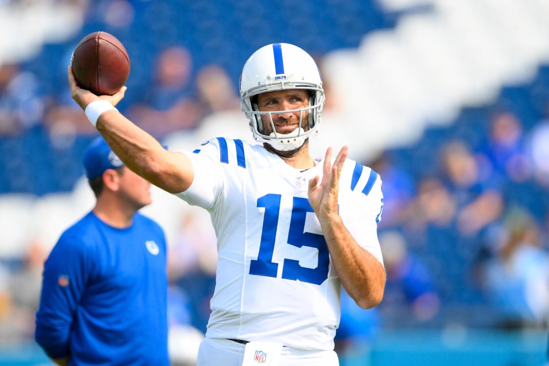 Colts quarterback Joe Flacco warms up against the Titans during the 2024 NFL season.