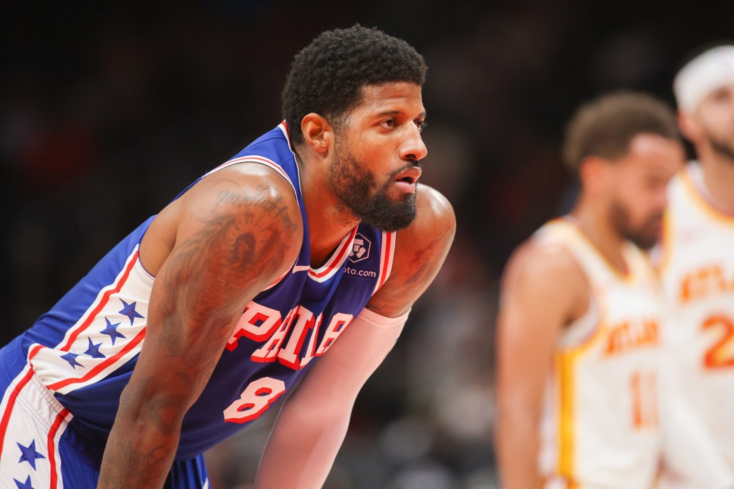 Sixers star Paul George looks on against the Hawks in the 2024-25 NBA season.