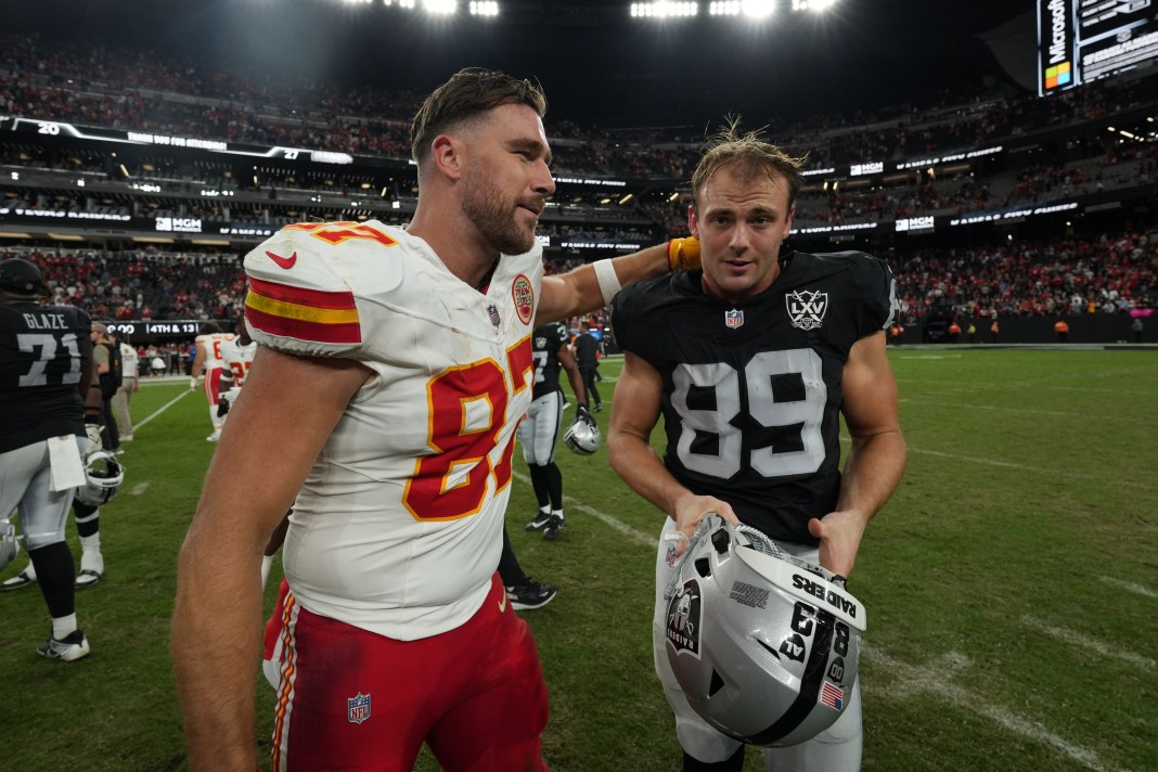 Kansas City Chiefs tight end Travis Kelce and Las Vegas Raiders tight end Brock Bowers interact after the game at Allegiant Stadium