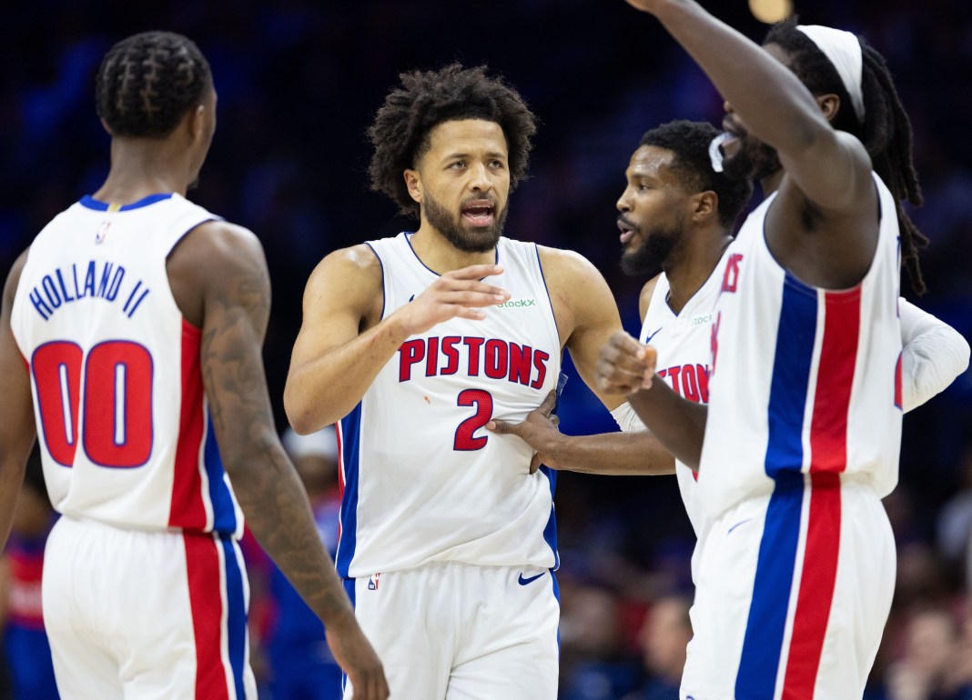 Pistons star Cade Cunningham directs his teammates in a game against the 76ers in the 2024-25 NBA season.