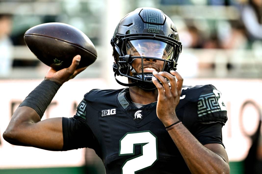 Michigan State's Aidan Chiles throws a pass before the game against Indiana