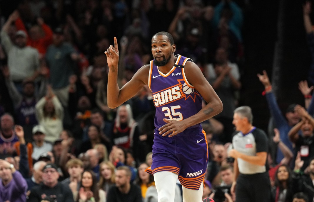 Suns star Kevin Durant celebrates a bucket against the Heat in the 2024-25 NBA season.