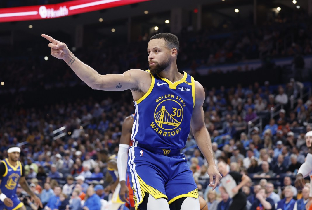 Warriors star Steph Curry gestures after a made basket against the Thunder in the 2024-25 NBA season.