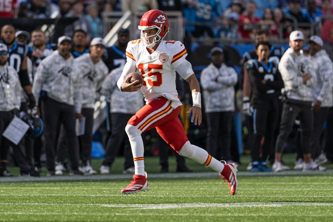 Chiefs star Patrick Mahomes takes off against the Panthers in Week 12 of the 2024 NFL season.