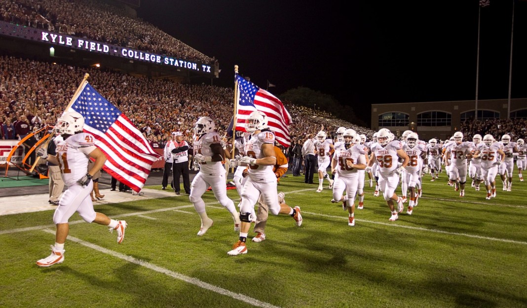 The Longhorns take the field before the game against Texas A&M at Kyle Field