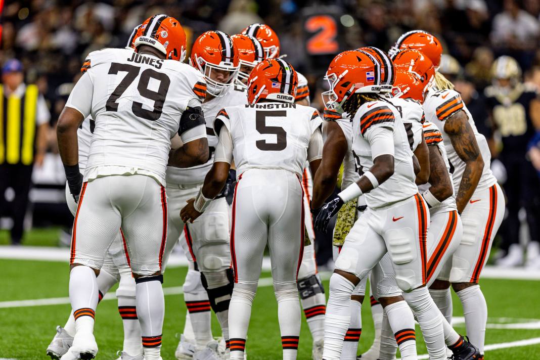 Cleveland Browns players huddle during a game against the New Orleans Saints