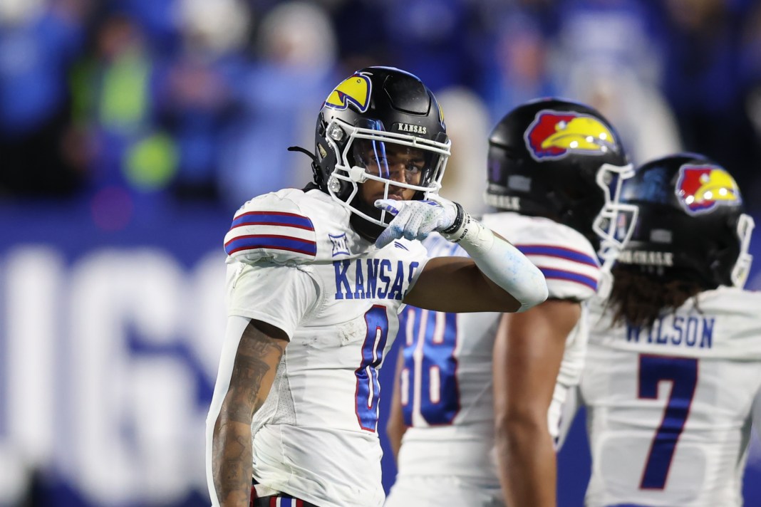 Kansas Jayhawks quarterback Isaiah Marshall reacts to a first down against the Kansas Jayhawks during the fourth quarter at LaVell Edwards Stadium