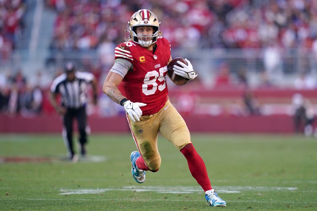 San Francisco 49ers tight end George Kittle runs with the ball