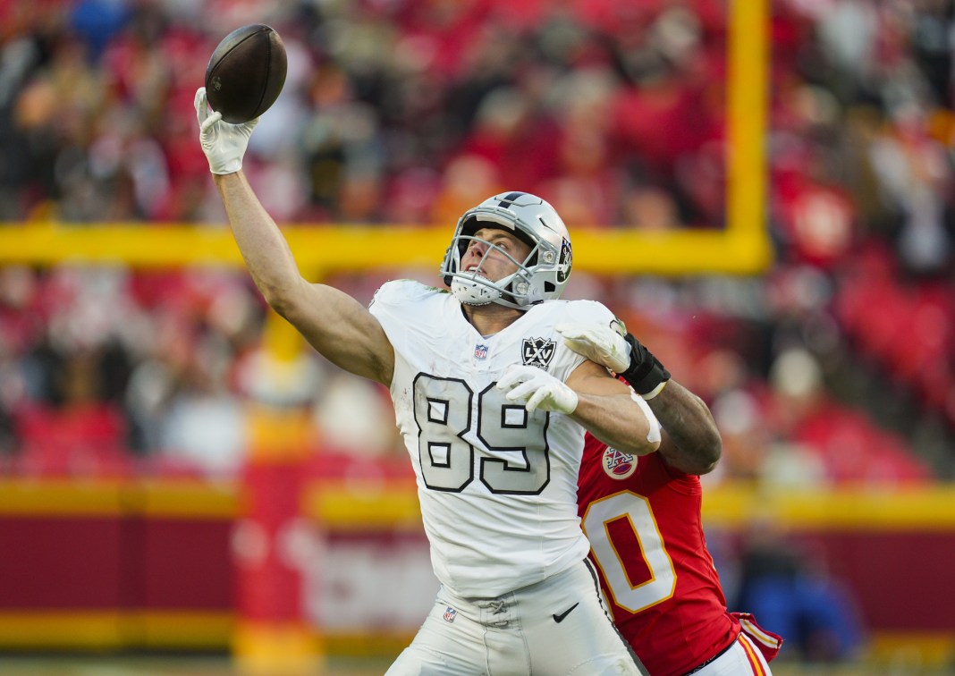 Las Vegas Raiders tight end Brock Bowers is unable to make a catch against Kansas City Chiefs safety Justin Reid