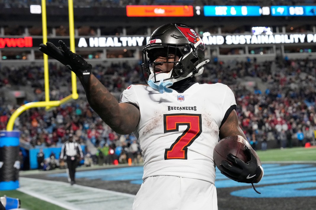 Tampa Bay Buccaneers running back Bucky Irving blows a kiss to the crowd after scoring a touchdown