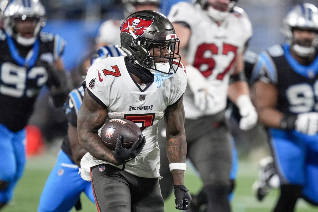 Tampa Bay Buccaneers running back Bucky Irving runs for yardage against the Carolina Panthers