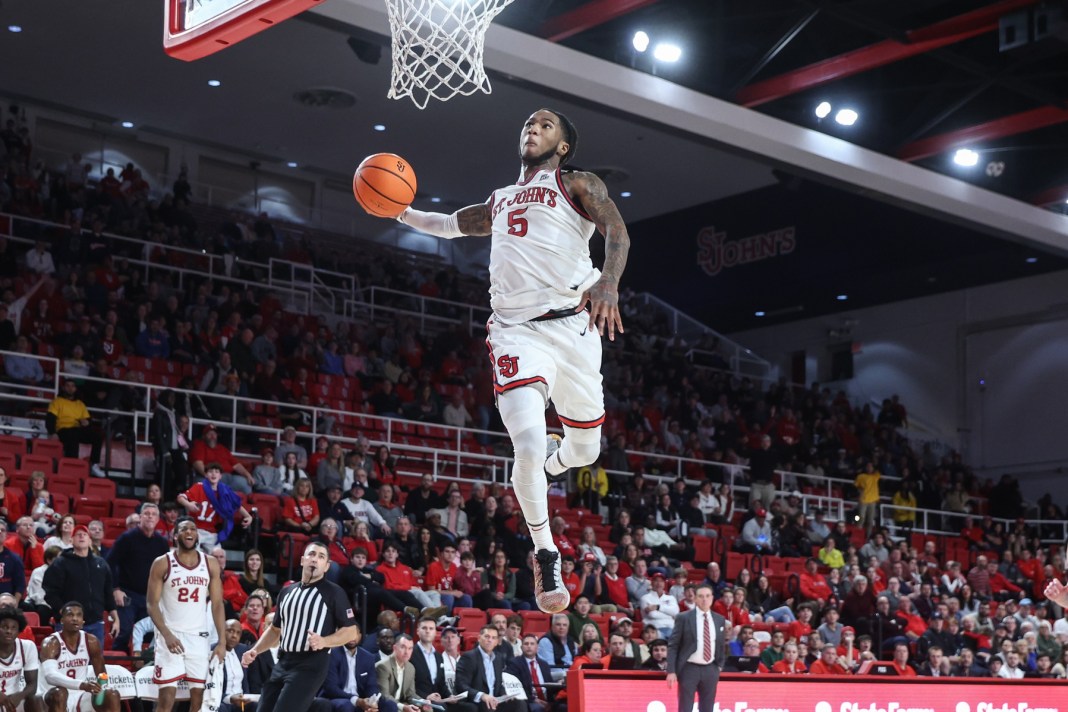 St. John's Red Storm guard Deivon Smith (5) attempts a dunk during the second half against the Delaware Fightin Blue Hens at Carnesecca Arena on December 28, 2024.