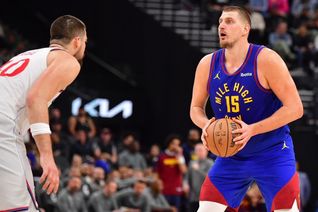 Denver Nuggets center Nikola Jokic controls the ball against Los Angeles Clippers center Ivica Zubac