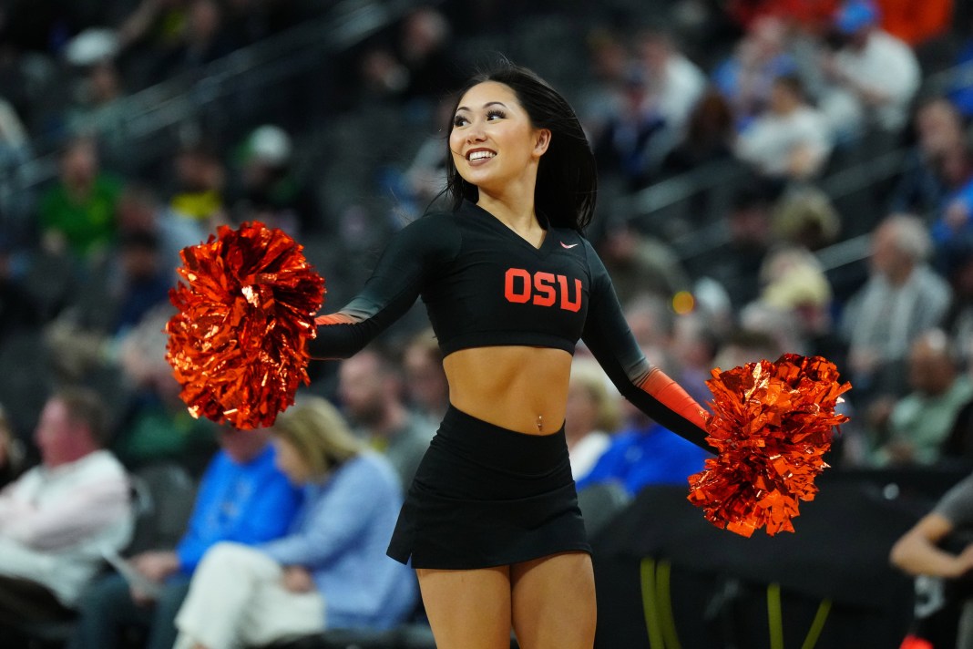 Oregon State Beavers cheerleader performs during the second half of the game versus the UCLA Bruins at T-Mobile Arena in Las Vegas on March 13, 2024