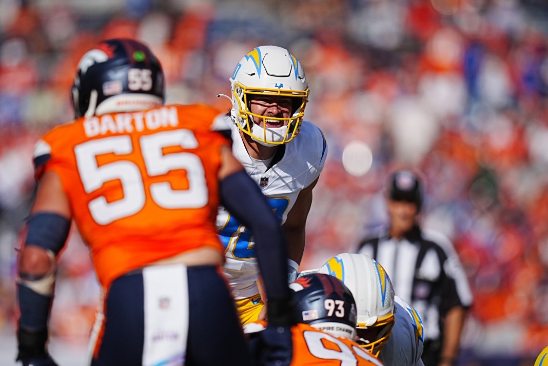 Los Angeles Chargers quarterback Justin Herbert calls out in the second quarter against the Denver Broncos at Empower Field at Mile High