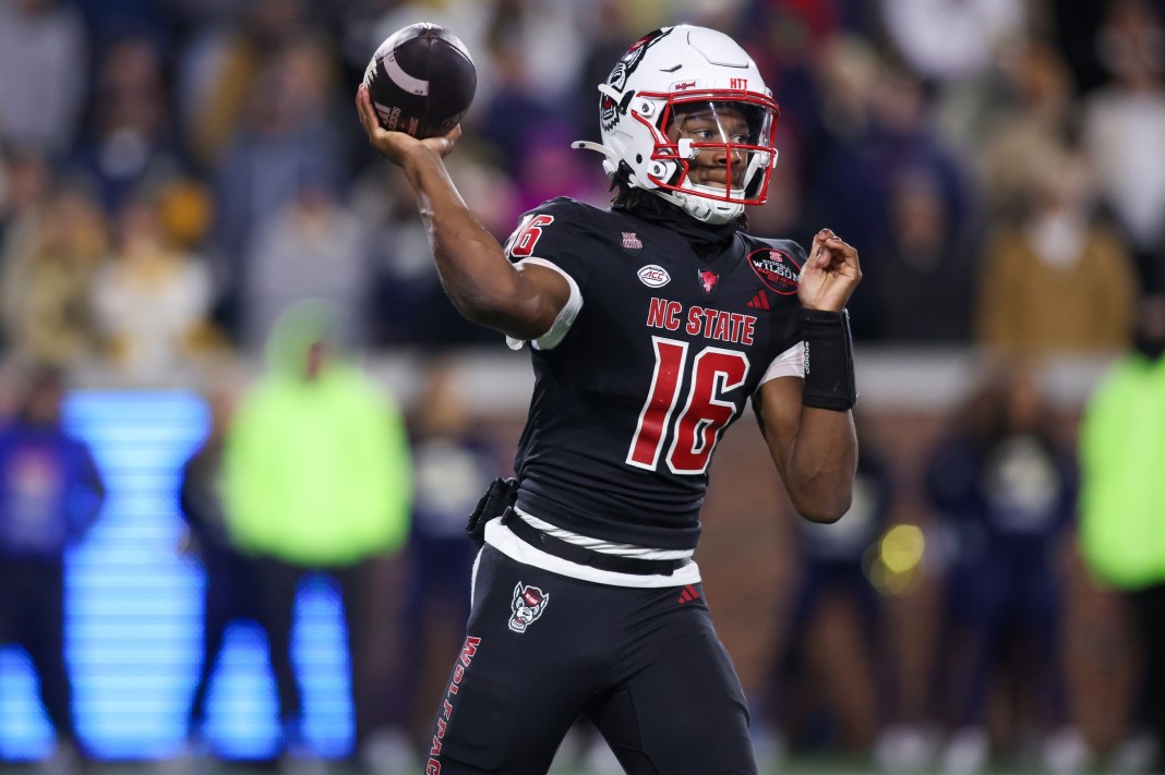 NC State quarterback CJ Bailey looks to throw against Georgia Tech during the 2024 college football season.