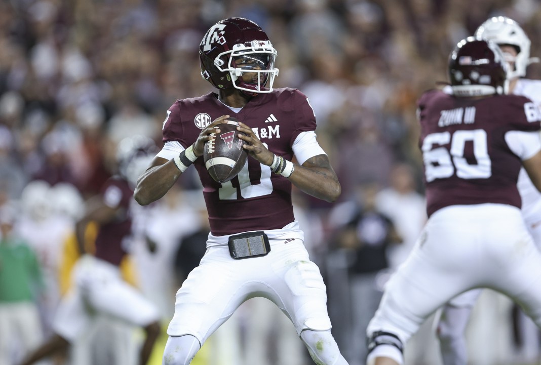 Texas A&M quarterback Marcel Reed throws a pass against Texas during the 2024 college football season.