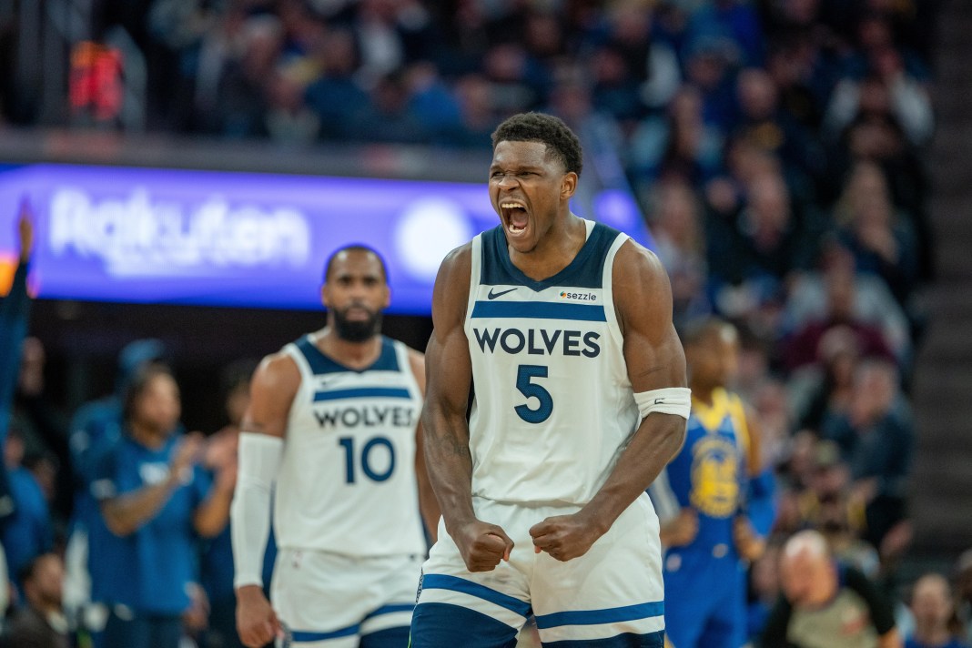 Timberwolves star Anthony Edwards celebrates a big shot against the Warriors during the 2024-25 NBA season.