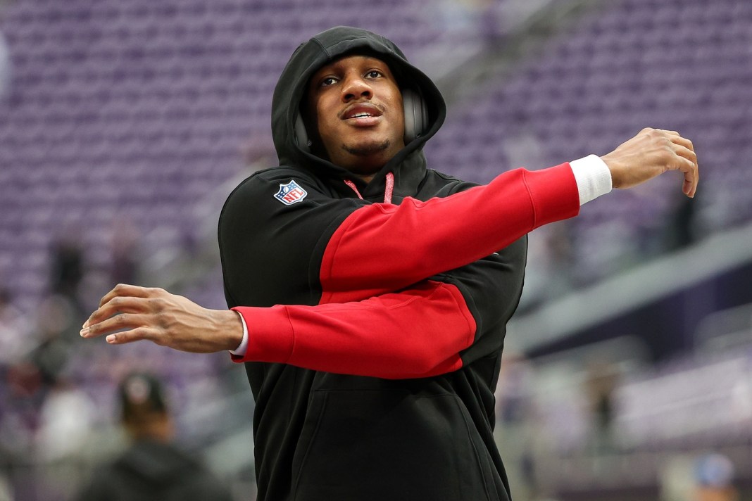 Atlanta Falcons quarterback Michael Penix Jr. warms up before the game against the Minnesota Vikings