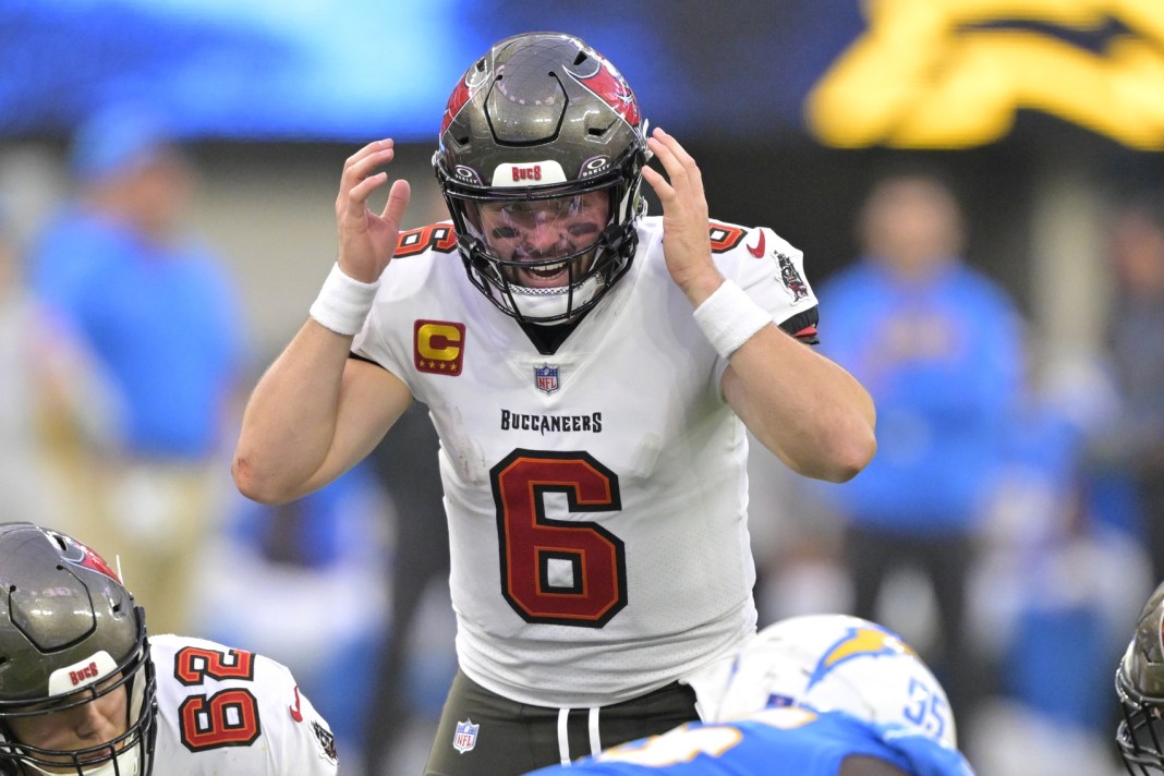 Buccaneers quarterback Baker Mayfield changes a play at the line of scrimmage during the 2024 NFL season.