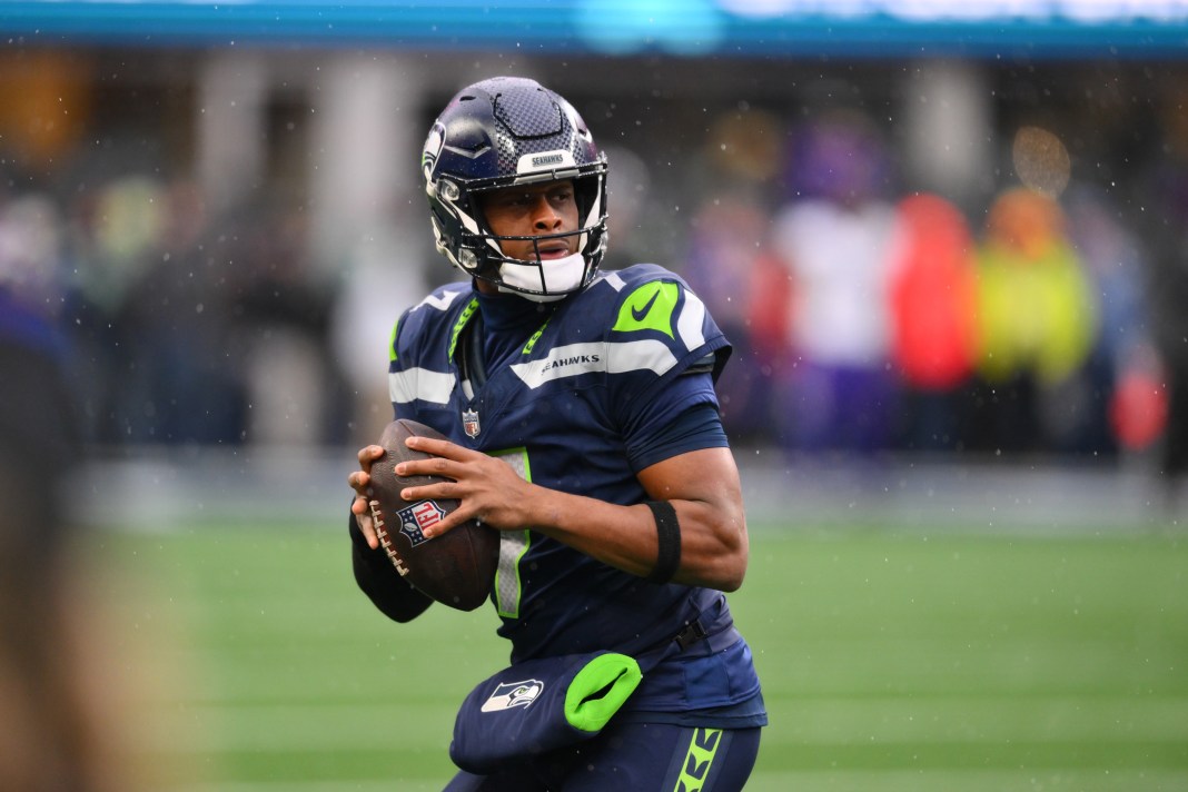 Seahawks quarterback Geno Smith looks to pass against the Vikings during the 2024 NFL season.