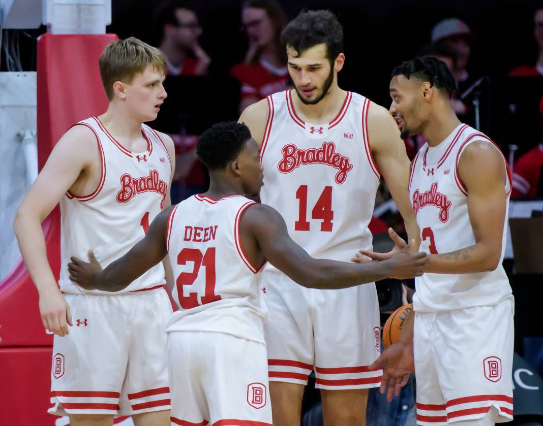 Bradley’s Duke Deen talks with his teammates during a break in the action against UTSA