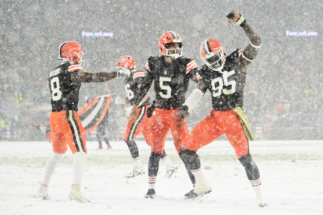 Cleveland Browns wide receiver Elijah Moore and quarterback Jameis Winston and tight end David Njoku celebrate after Winston scored a touchdown