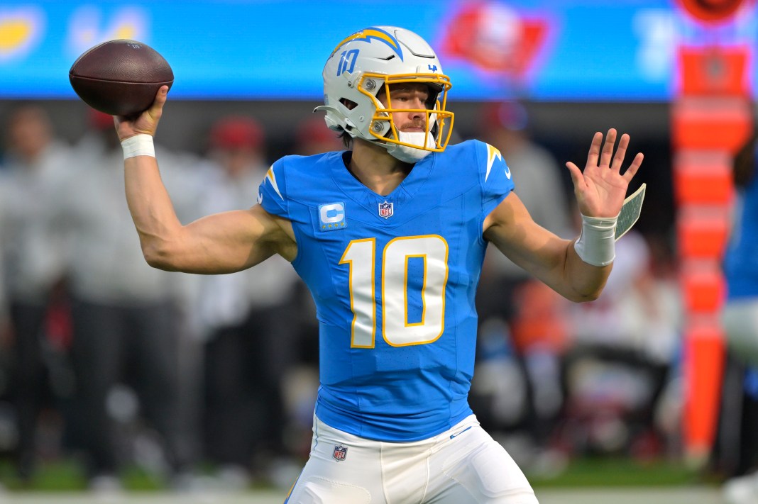 Los Angeles Chargers quarterback Justin Herbert sets to pass in the first half against the Tampa Bay Buccaneers