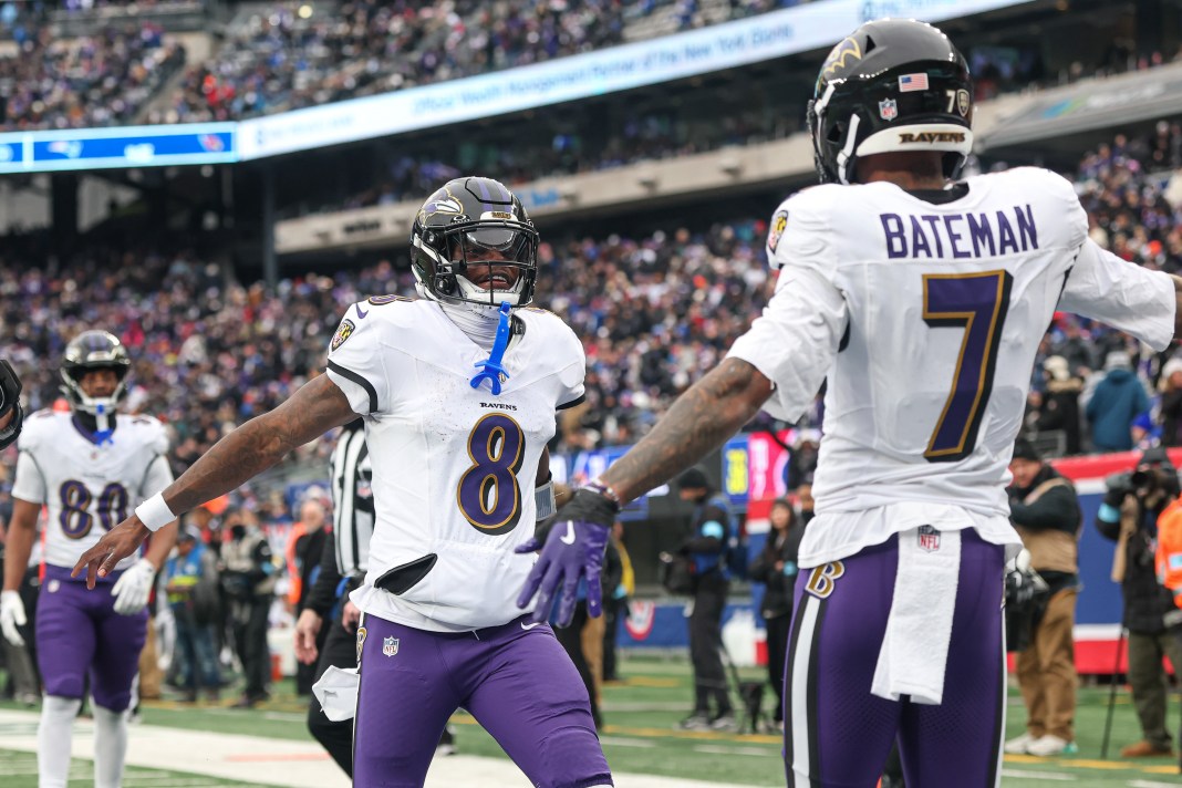 Baltimore Ravens quarterback Lamar Jackson and wide receiver Rashod Bateman celebrate after a touchdown pass