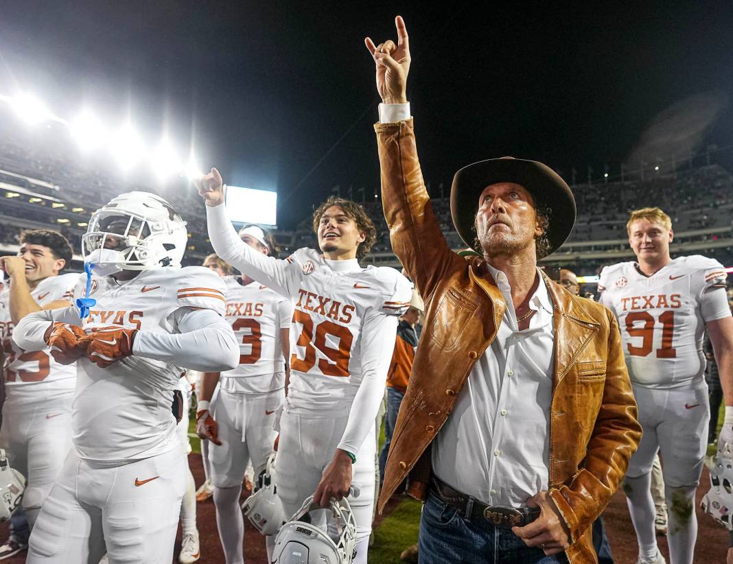 Actor Matthew McConaughey celebrates the 17-7 Texas Longhorns win over Texas A&M in the Lone Star Showdow