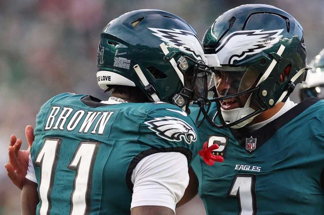 Philadelphia Eagles quarterback Jalen Hurts (1) and wide receiver A.J. Brown (11) celebrate a touchdown during the first half of the NFC Championship game against the Washington Commanders at Lincoln Financial Field on January 26, 2025