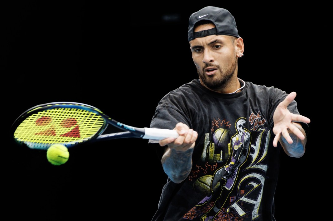 Nick Kyrgios hits a forehand during a practice session in 2023.