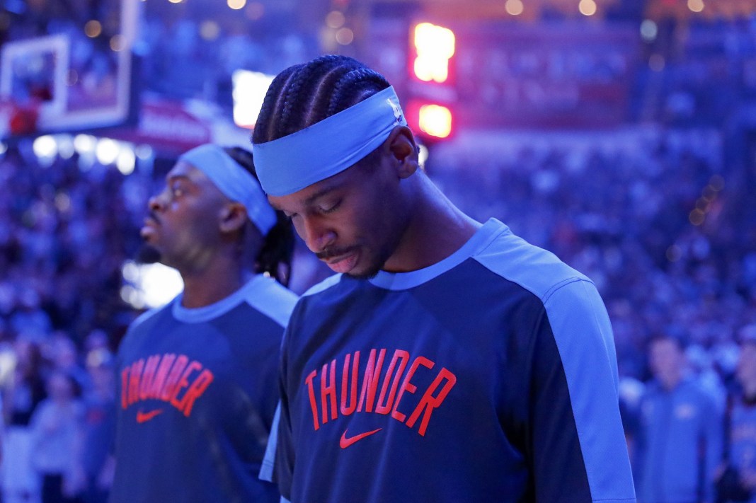 Thunder star Shai Gilgeous Alexander during the National Anthem in the 2024-25 NBA season.