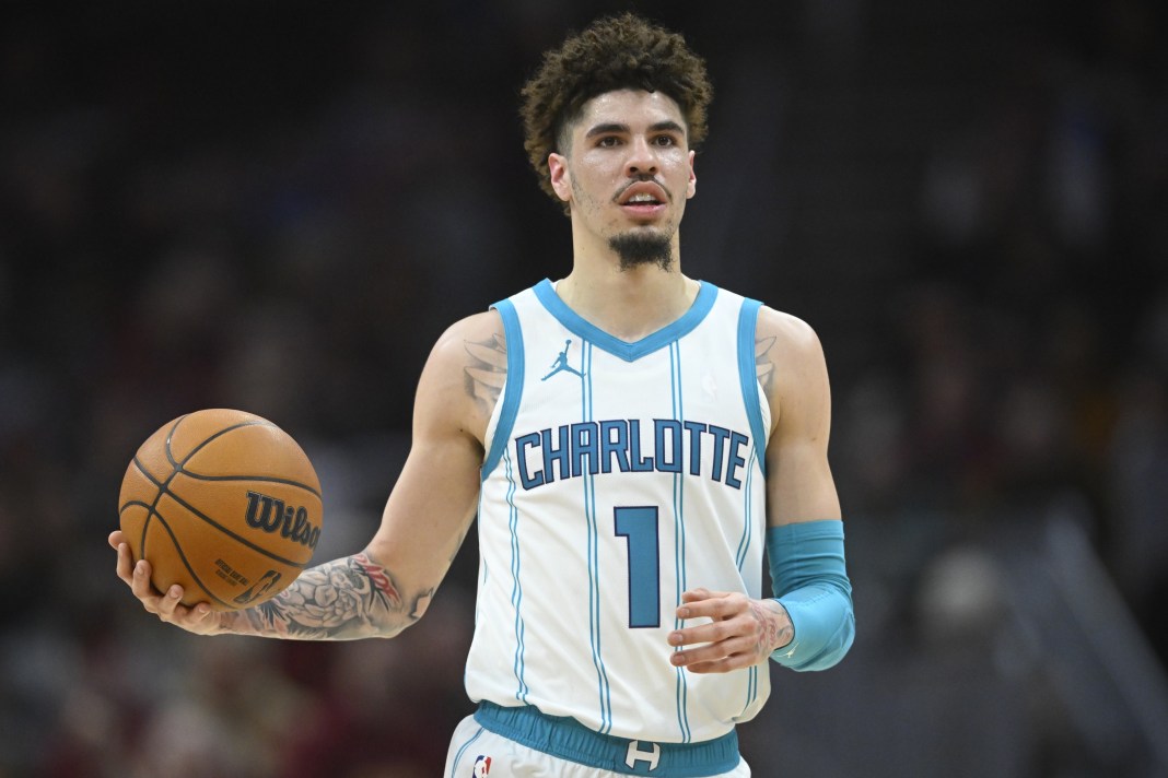 Hornets guard LaMelo Ball looks to make a play against the Cavaliers during the 2024-25 NBA season.