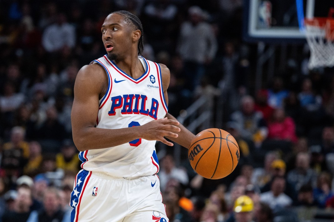 Sixers star Tyrese Maxey surveys the floor against the Pacers during the 2024-25 NBA season.