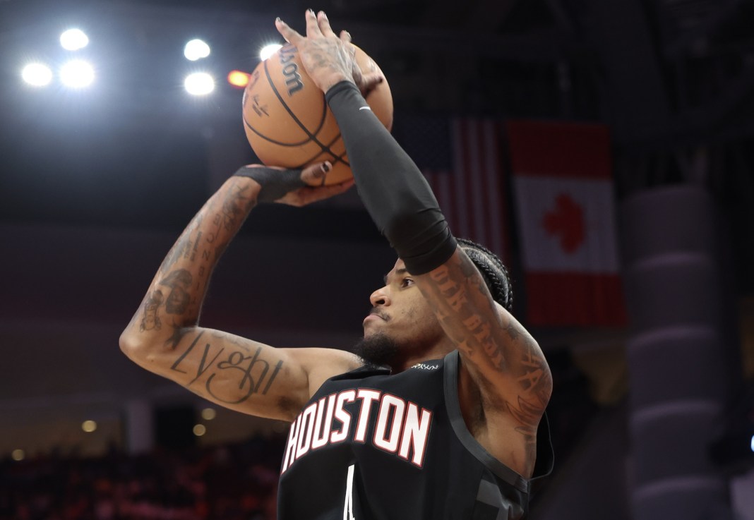 Rockets guard Jalen Green takes a jumper against the Pistons during the 2024-25 NBA season.