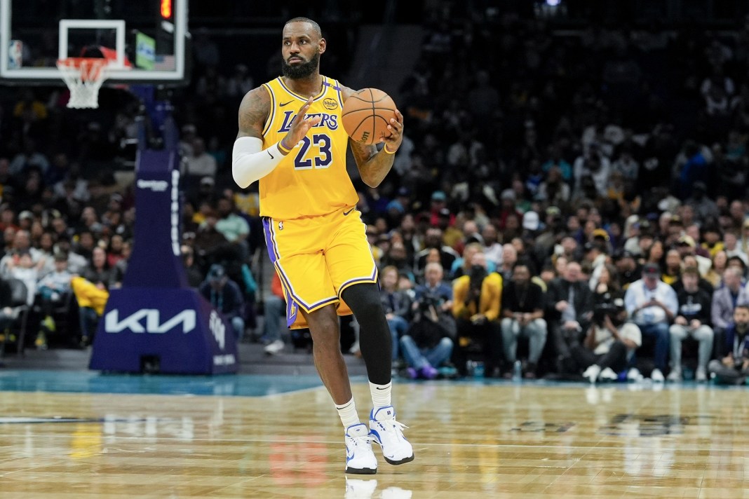 Lakers superstar LeBron James looks to make a play against the Hornets in the 2024-25 NBA season.