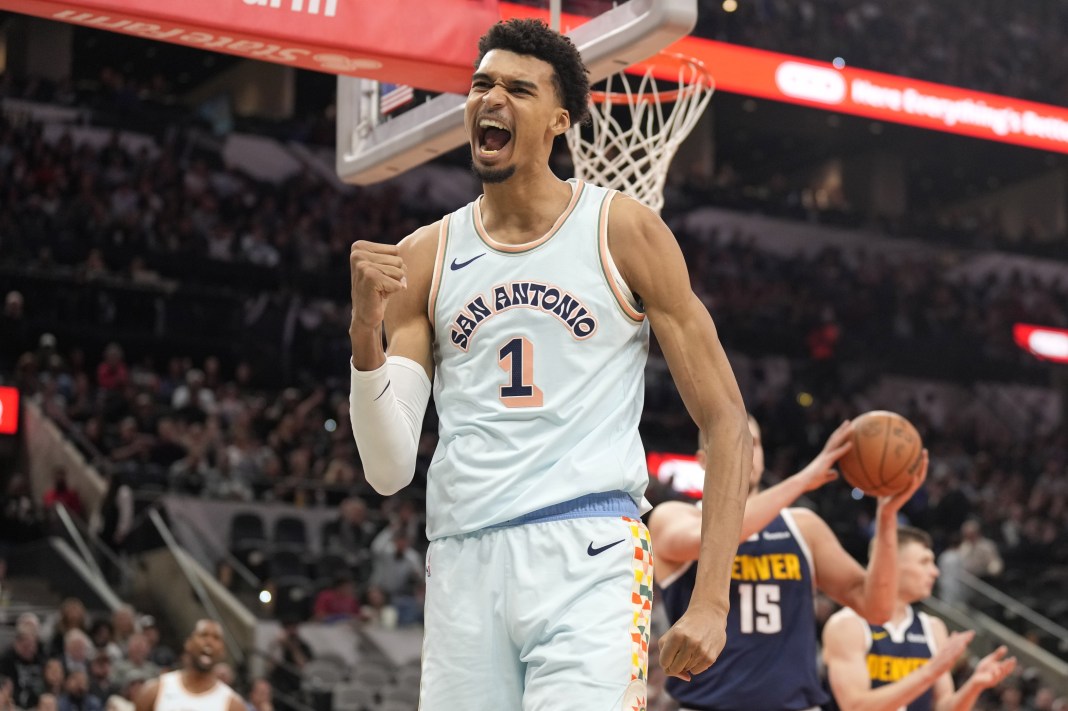 San Antonio Spurs center Victor Wembanyama (1) reacts after drawing a foul while scoring against the Denver Nuggets during the first half at Frost Bank Center on January 4, 2025