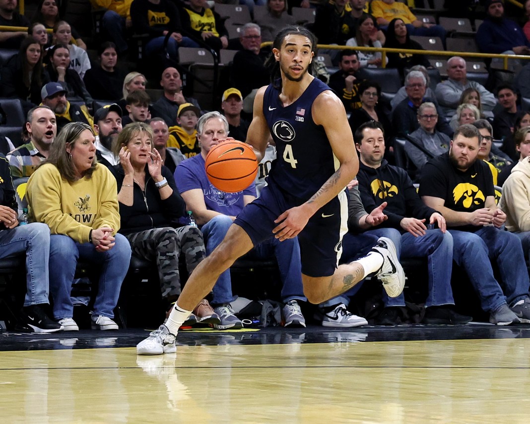 Penn State Nittany Lions guard Freddie Dilione V (4) dribbles the ball against the Iowa Hawkeyes during the first half at Carver-Hawkeye Arena on January 24, 2025