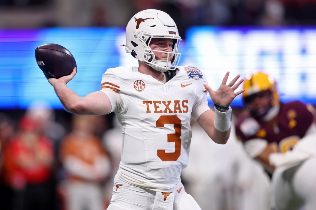 Texas Longhorns quarterback Quinn Ewers (3) throws a pass during the first half against the Arizona State Sun Devils in the Peach Bowl at Mercedes-Benz Stadium on January 1, 2025