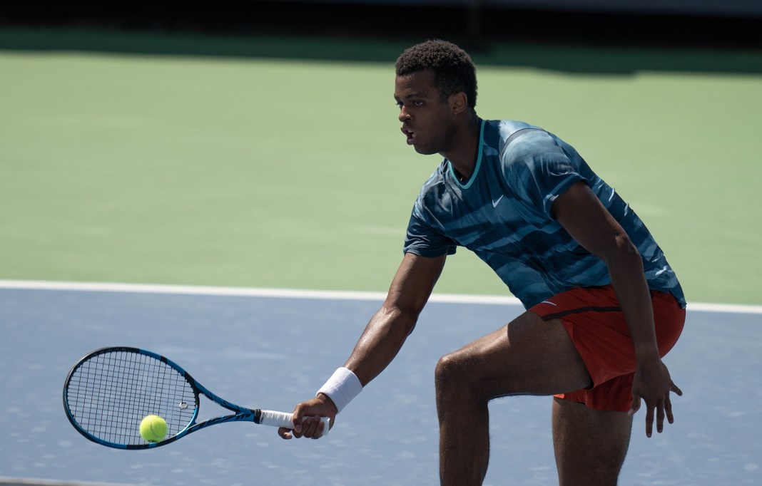 Giovanni Mpetshi Perricard hits a volley at the Cincinnati Open during the 2024 tennis season.